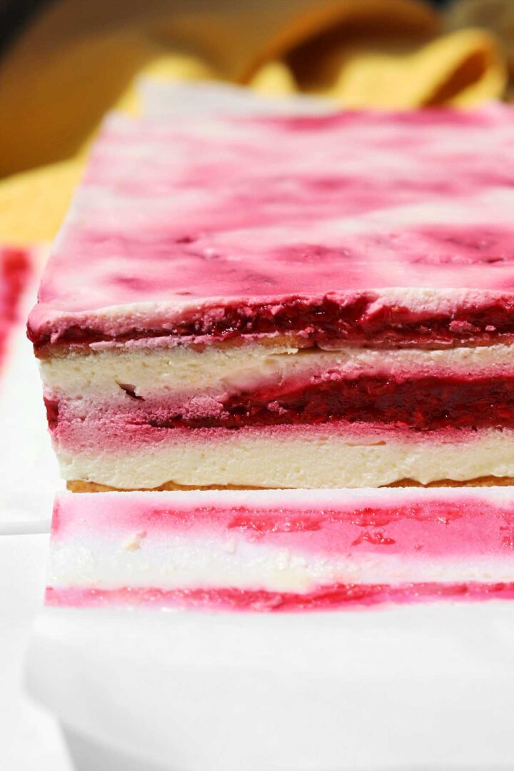 raspberry lemonade icebox cake layers out of pan before decorating and slicing