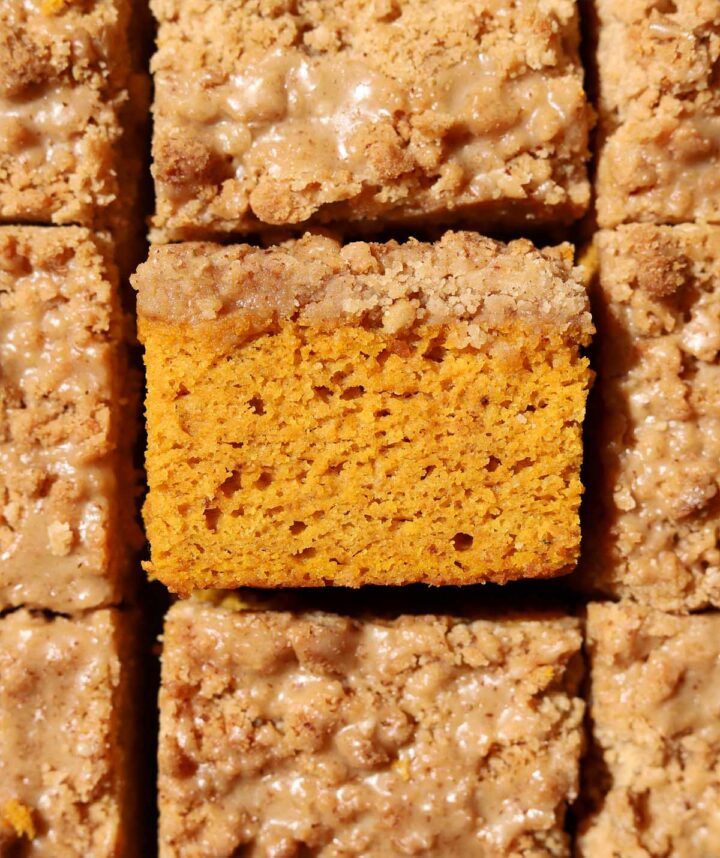 top view of the best pumpkin coffee cake sliced showing soft crumb texture