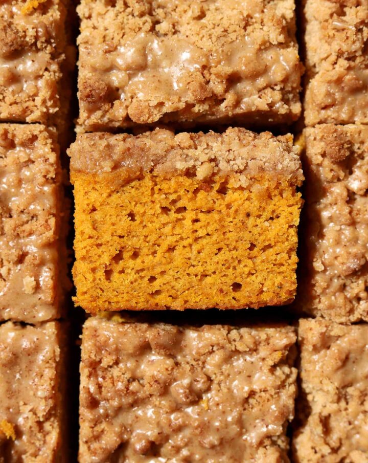 top view of the best pumpkin coffee cake sliced showing soft crumb texture