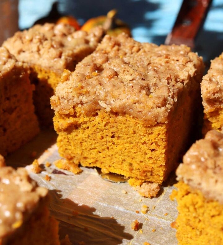 slice of the best pumpkin coffee cake on a cake server