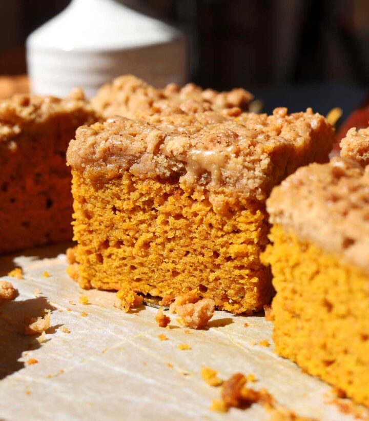 slice of the best pumpkin coffee cake on a cake server