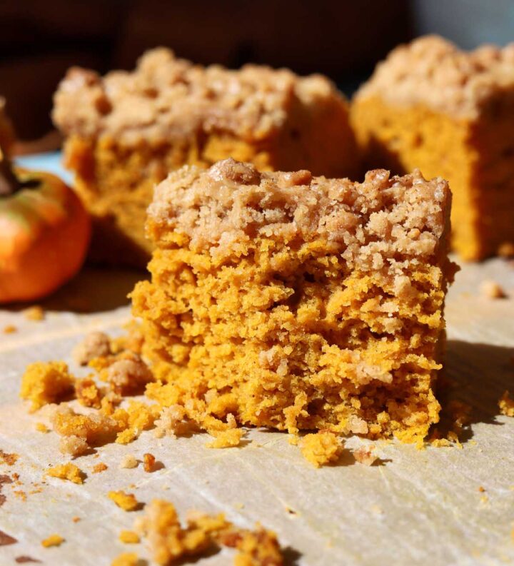 slice of the best pumpkin coffee cake with bite