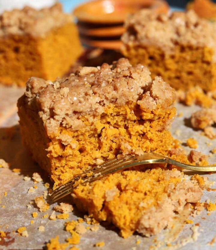 slice of the best pumpkin coffee cake with bite and fork