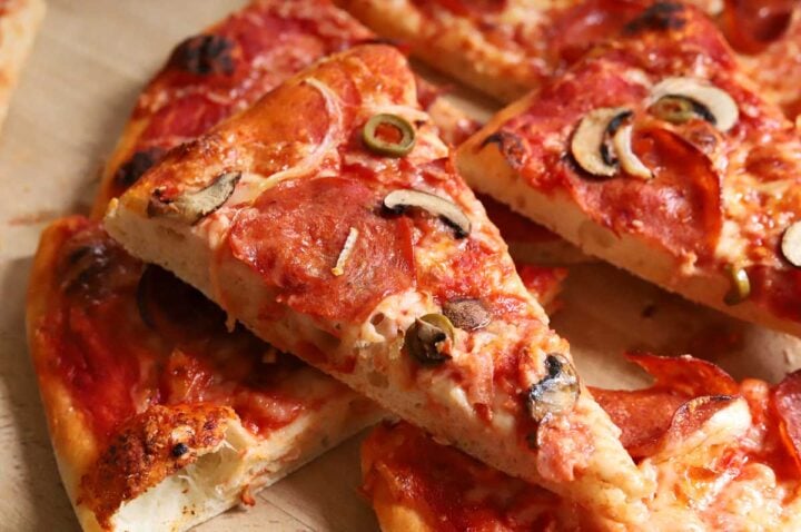 homemade pizza with toppings on homemade pizza dough