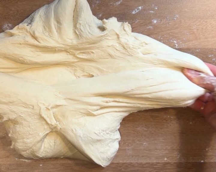 Stretch and fold the dough to help build more structure.