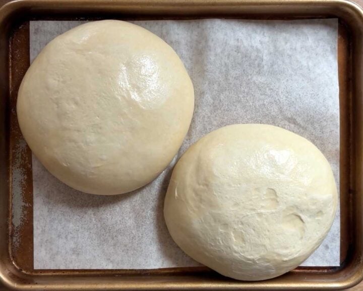 Risen dough should be puffed and relaxed for easy rolling.