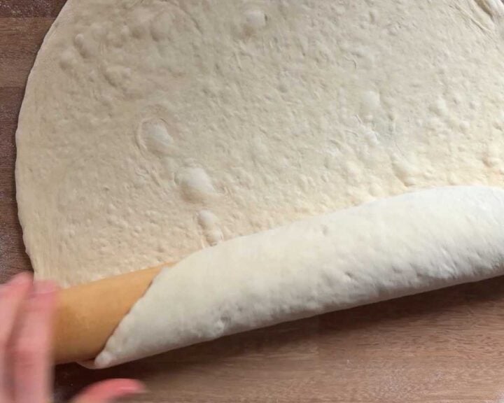 Roll up the dough over the rolling pin...