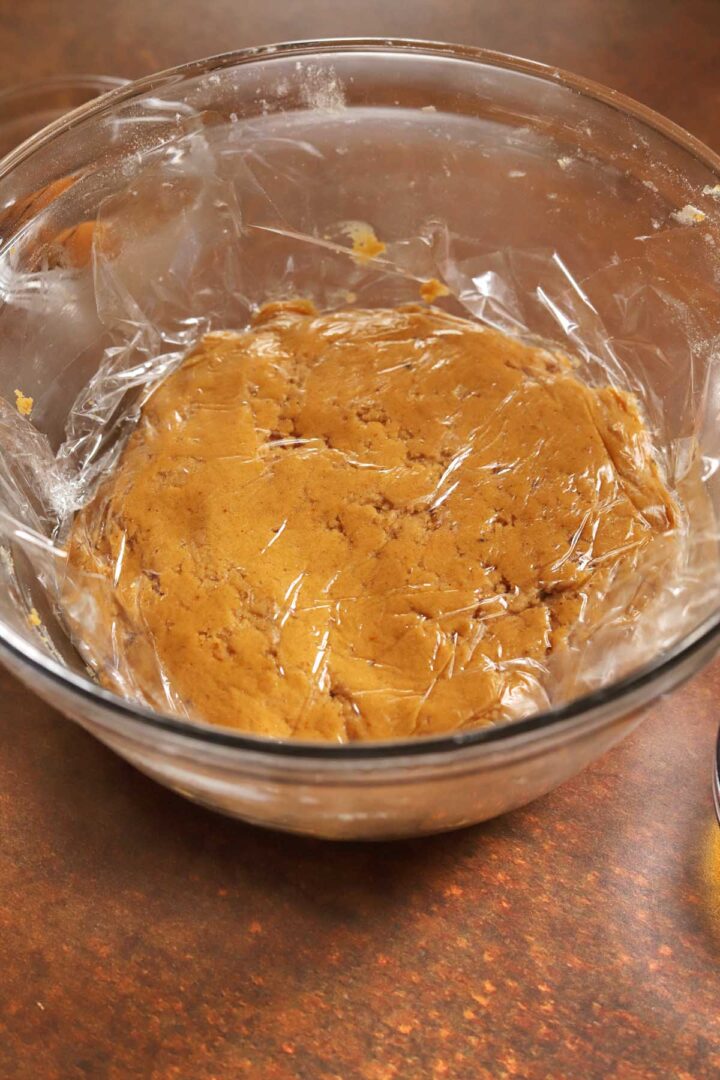 bowl of pumpkin cookie dough after chilling in the fridge