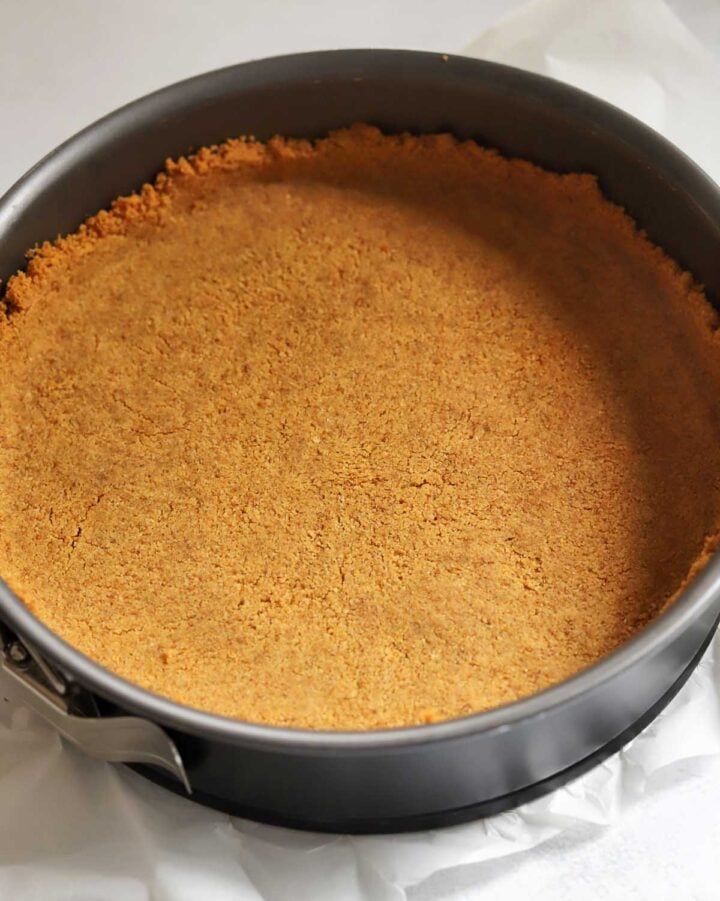 homemade graham cracker crust in baking pan