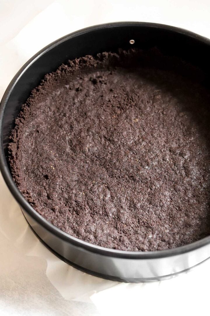Oreo cookie crust for cookies and cream cheesecake after baking