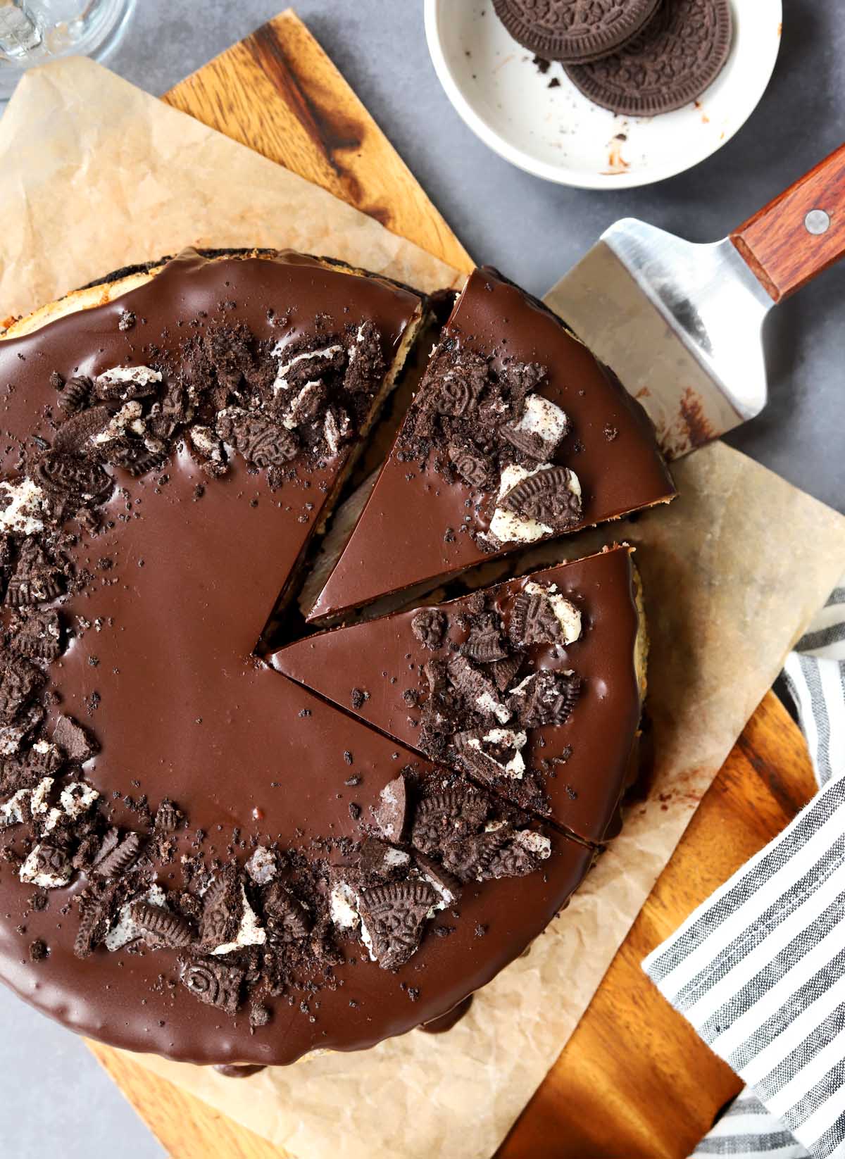 top view of sliced Oreo cookies & cream cheesecake