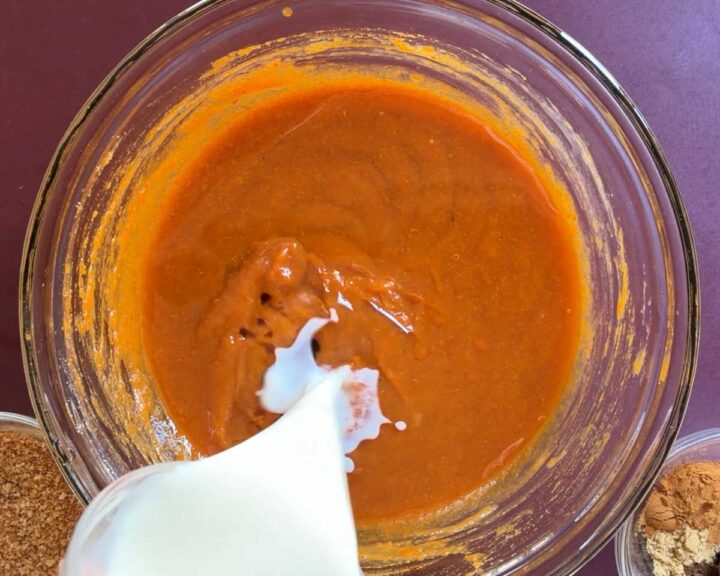 Add oil, milk and vanilla and whisk to blend well.