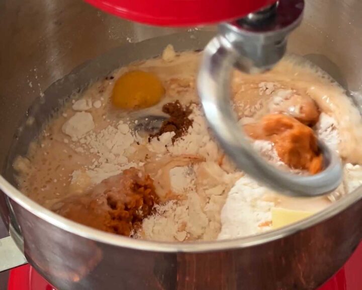 Attach the bowl to the mixer and begin mixing on low speed.