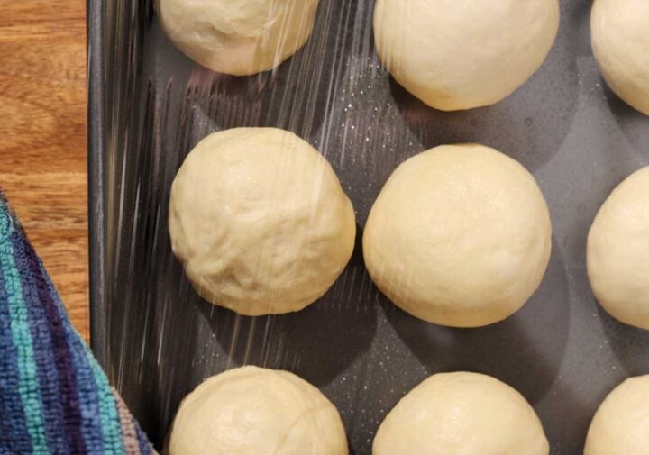 showing the difference between dough balls that shaped with tension and without tension