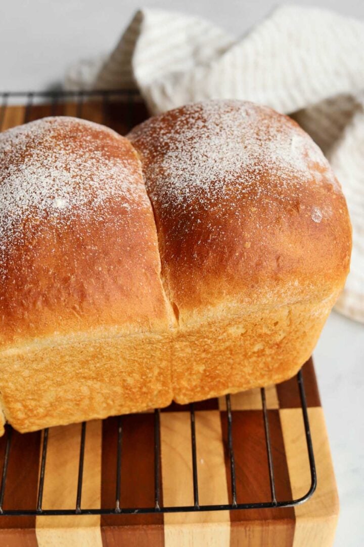 homemade sandwich bread after baking, cooling on wire rack
