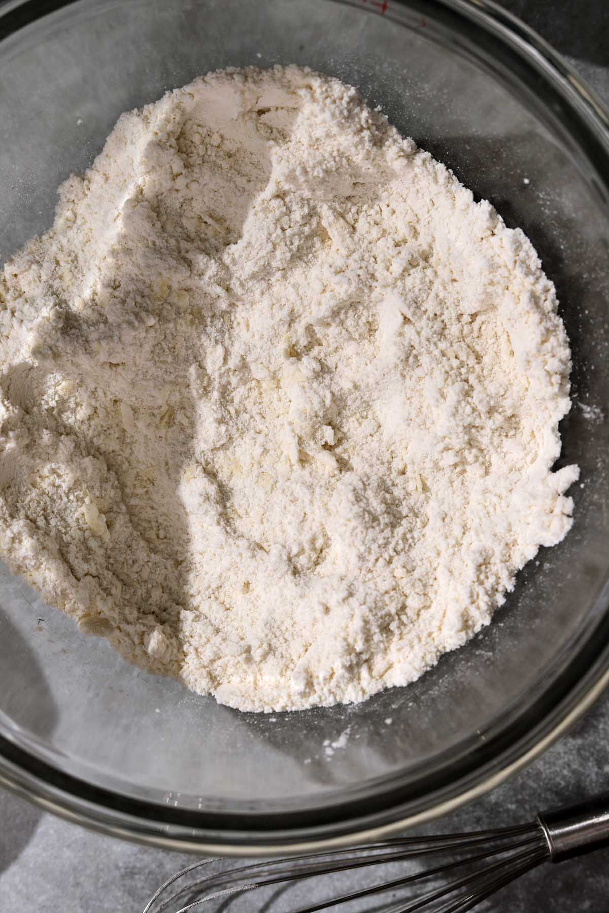 Crumbly mixture after rubbing 2 tablespoons of butter into flour.
