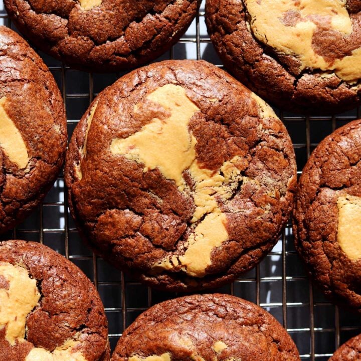 chocolate peanut butter fudge swirl cookies on cooling rack