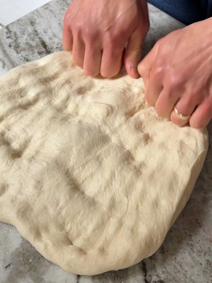 To make the traditional loaf, flatten the dough into a square the length of your pan.