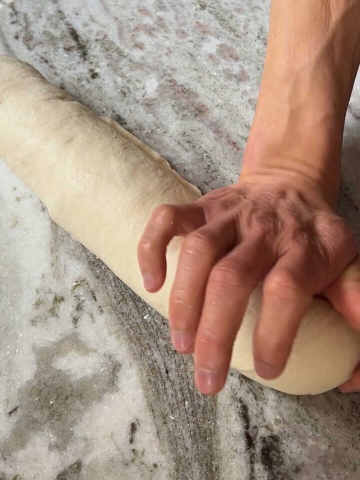 Use your palm to pinch the seam down.