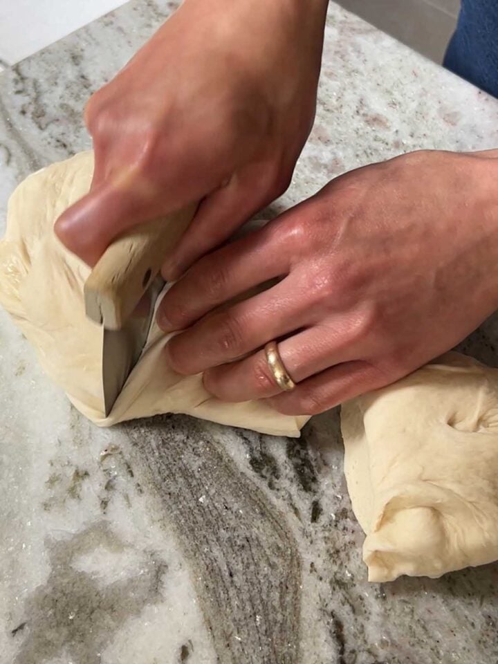To make the 3-piece loaf, divide the dough into three portions.