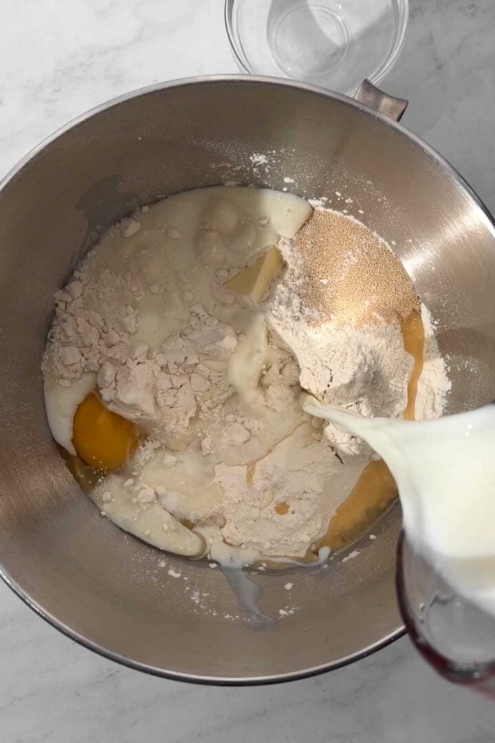 Combine all dinner rolls ingredients in the mixer bowl.