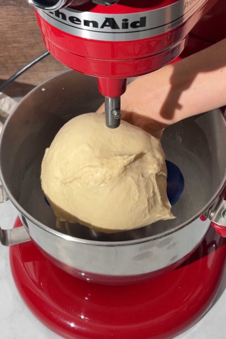 Knead until it forms a smooth, soft, cohesive and tacky dough.