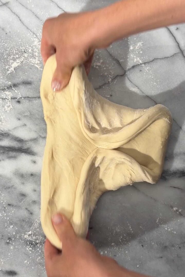 Stretch and fold the dough several times.