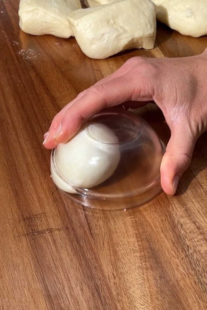 Shape the dough into smooth, taut, balls with tension.