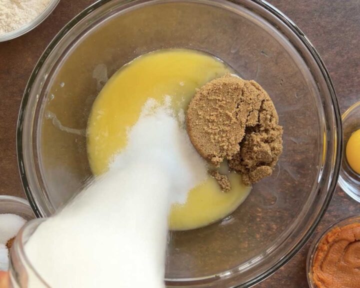 Combine melted butter with both sugars.