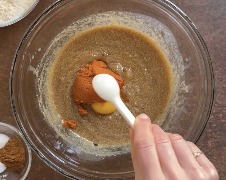 Add pumpkin puree, egg yolk and vanilla.