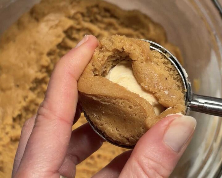 Wrap the dough around the cheesecake filling.